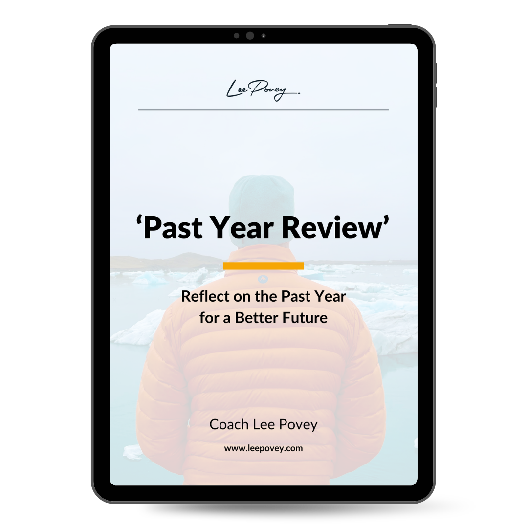 E-book cover for 'Past Year Review' by Coach Lee Povey, featuring a person in an orange jacket overlooking an icy landscape.