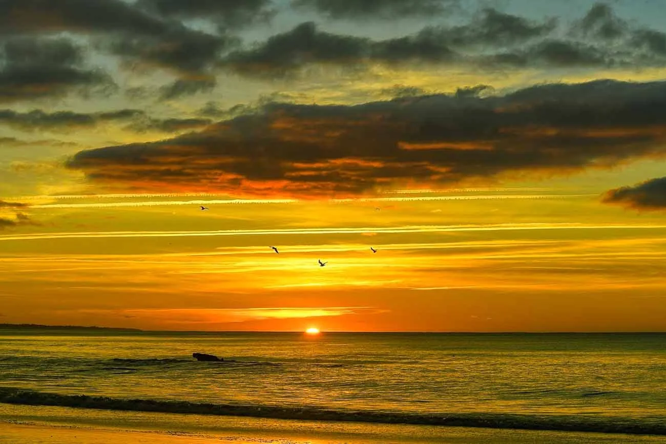 Sunrise on one of the many beautiful beaches on the Algarve Coastline