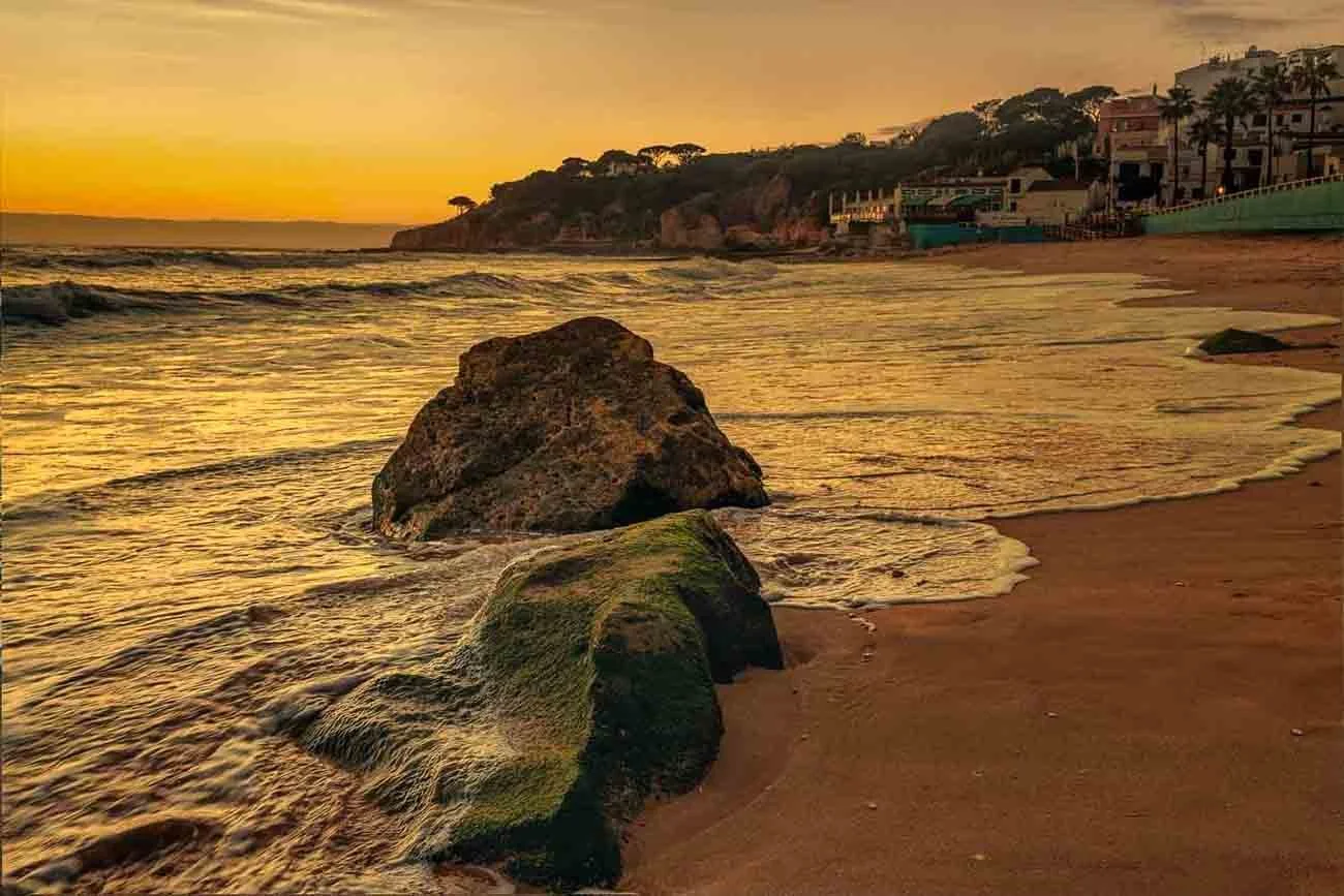 A sunset view from the beach of Olhos de Aqua Algarve Portugal