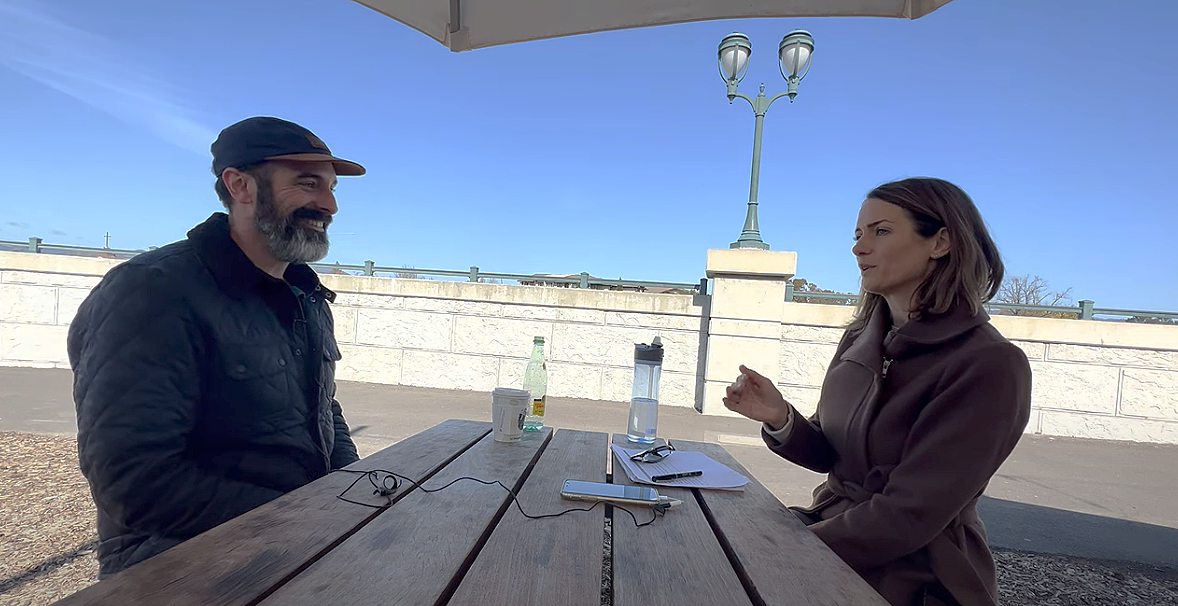 Priscillia de Muizon interviewing innovator Charlie Crebs at outdoor table in Napa CA