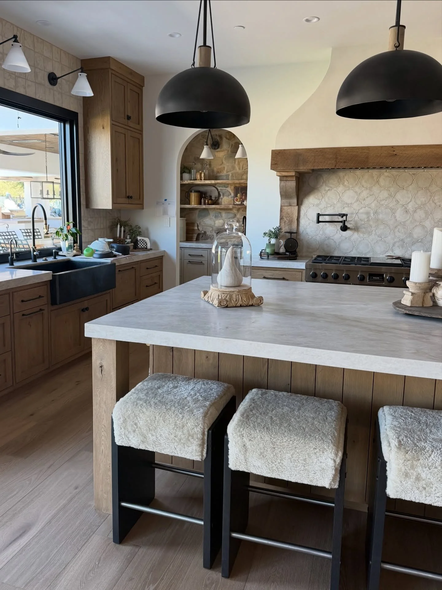 Designed with intention. Custom kitchen hood range with corbels, Elm live-edge pantry shelves, and ceiling beams.

A space made for family memories.
.
.
.
#usreclaimed #bulterspantry #kitchen #corbels #ceilingbeams