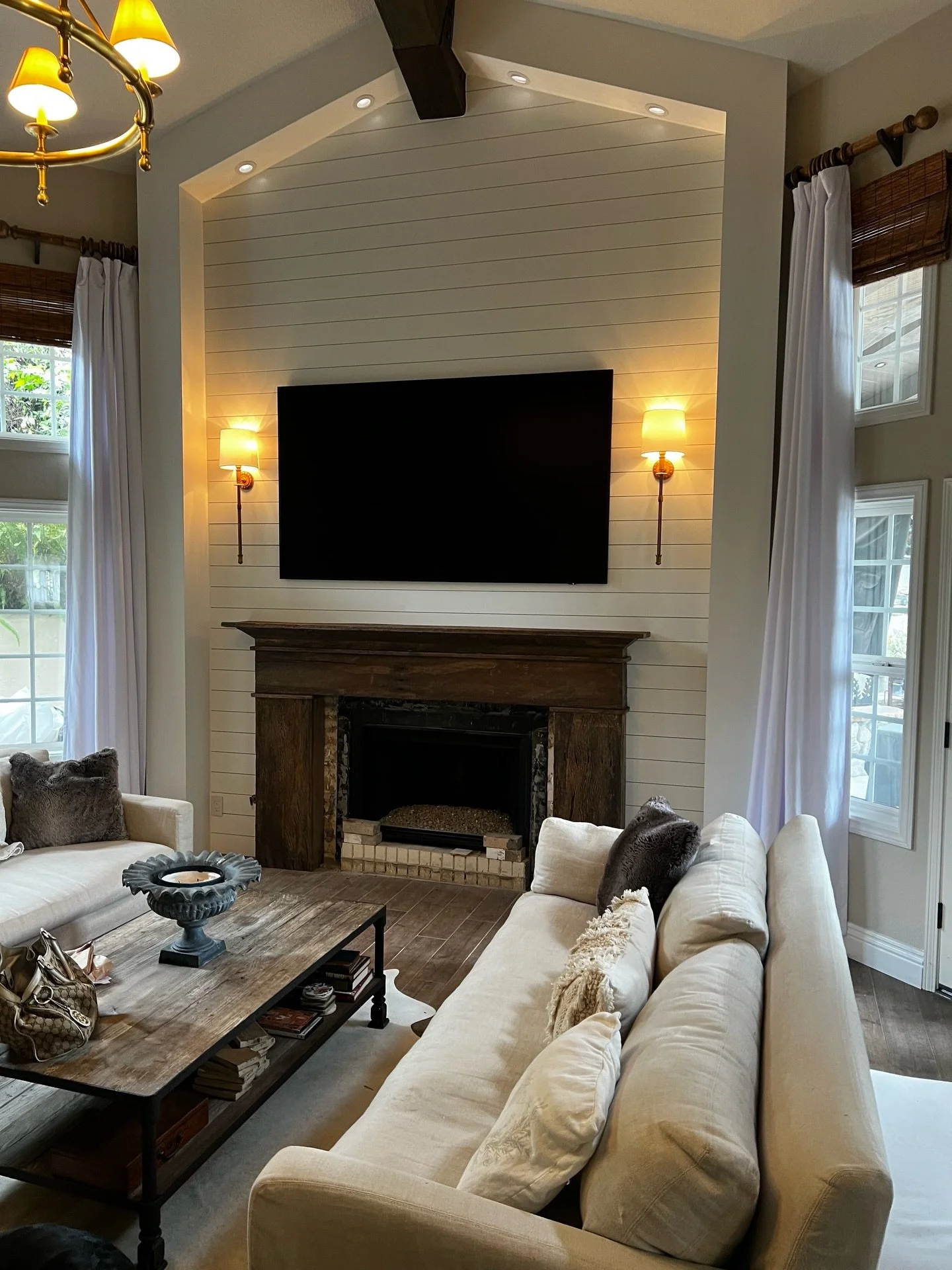 Not your average fireplace surround. 🪵

Custom trim details frame the fireplace while preserving the original patina of the reclaimed wood, making it the center of attention in the room.

Tile not yet installed.

🔥 Ready to make your fireplace the 