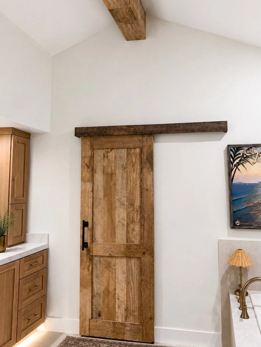 Custom details that make a house feel like home. 🚪

We built this reclaimed shaker-style barn door and paired it with matching ceiling beams to bring natural texture and history into the home. 

Timeless character. Honest materials. Made to last.

D