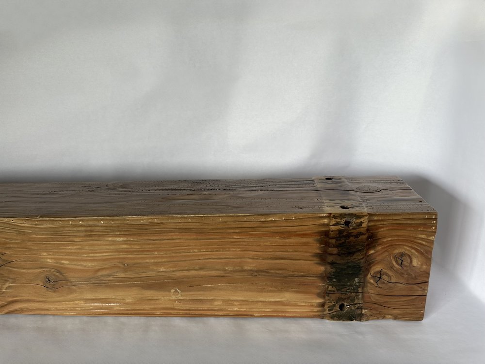 We call this one-of-a-kind piece "Water Wood" due to its incredible history of spending 90 years submerged underwater.