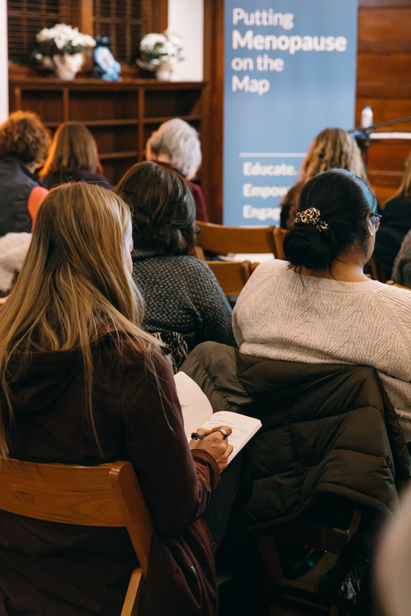 Guests engaging in conversation at the Meno on Map event, captured during a company gathering in Colorado.