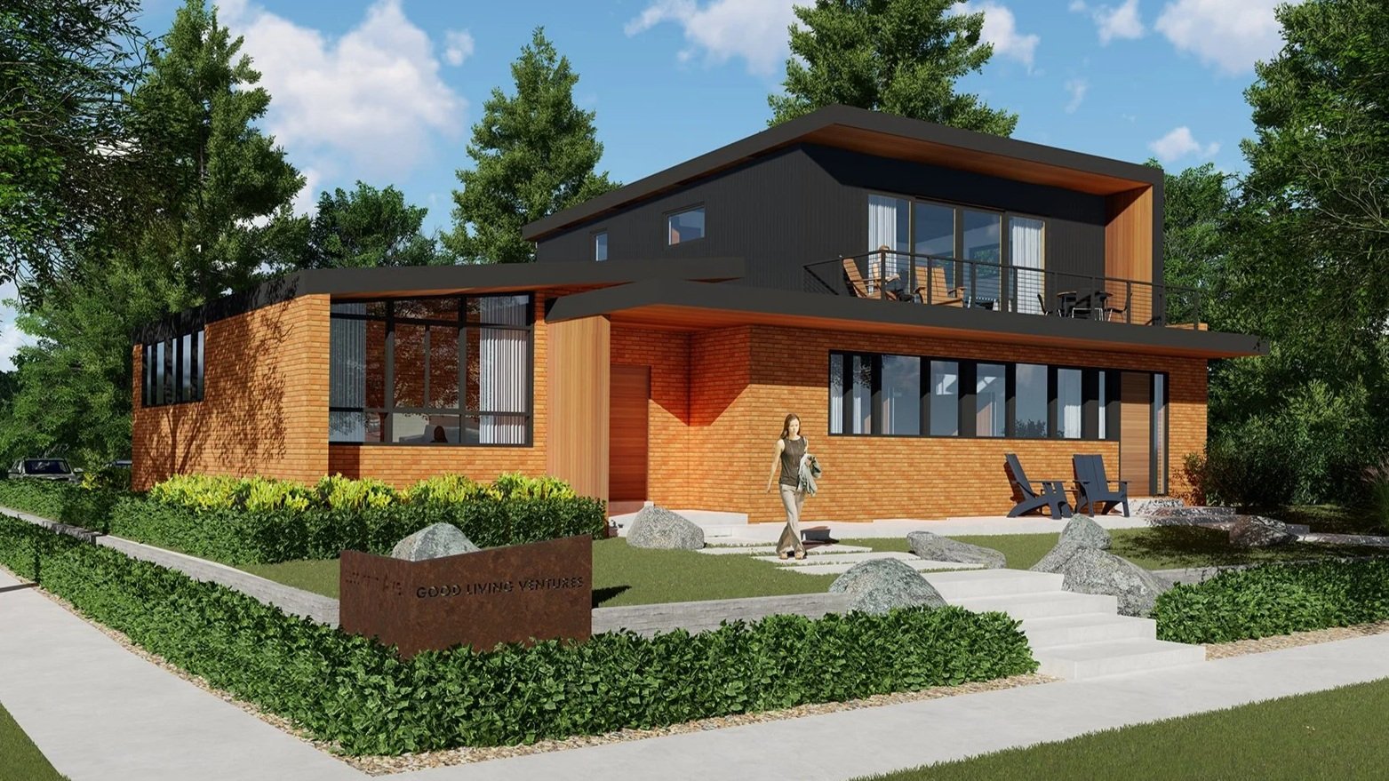 Modern two-story house with brick and black siding, large windows, and a spacious balcony, surrounded by greenery and a sidewalk.