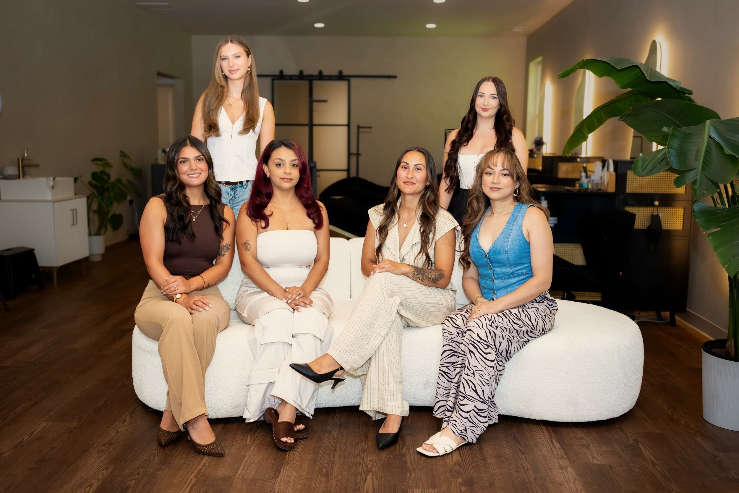 Amada Lash Studio team members together inside the salon