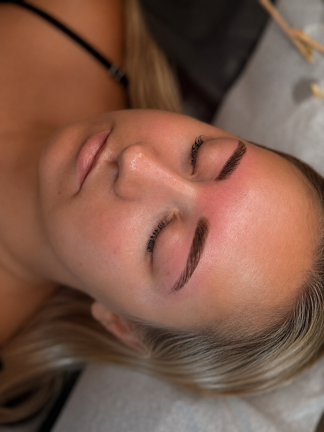 Close-up of professionally shaped natural brows