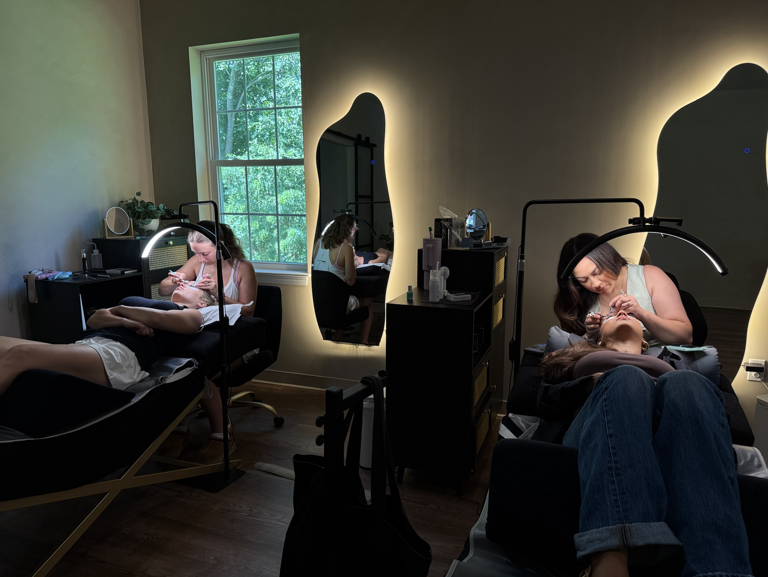Client relaxing during a customized lash appointment at Amada Lash Studio