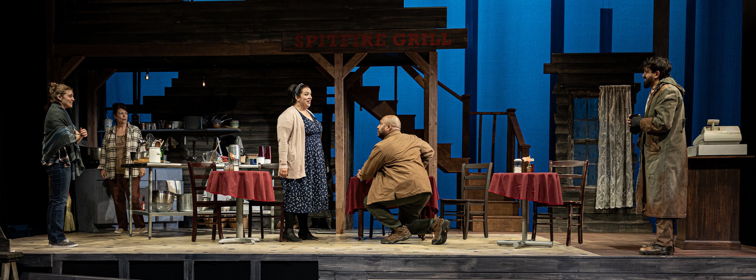 THE SPITFIRE GRILL - Photos by Jim Sabitus | Director: Ilyse Robbins | Scenic Designer: Janie E. Howland | Costume Designer: Kelly Baker | Lighting Designer: Karen Perlow | Sound Designer: Alex Berg | Venue: Umbrella Arts Center Mainstage Theater, Co