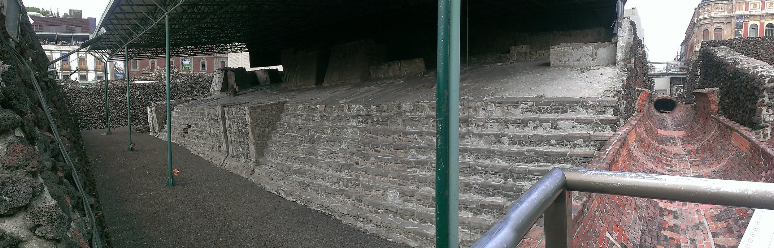 Figure 5. A layer of the Templo Mayor site under a protective roof with an aqueduct on the right (Whitehouse 2014).