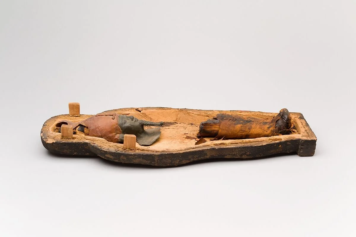 Figure 48. Interior Coffin and corn mummy with Osiris mask Late Period–Ptolemaic Period 400–200 BC