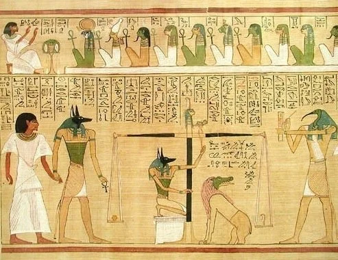 Figure 8. Anubis guiding the deceased to the Hall of Two Truths for the heart weighing ceremony.