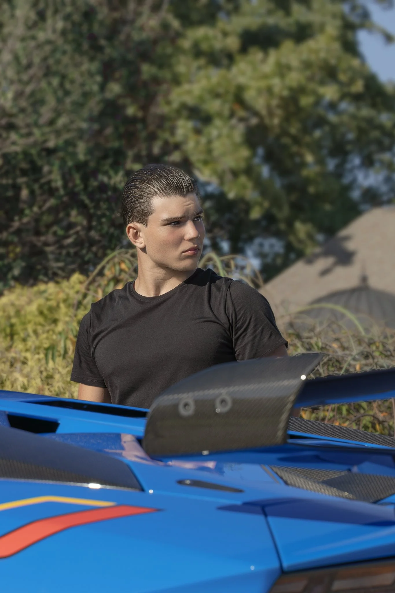 2024_09_22_0119 Young Man Blue Car Road Ahead-vertical.jpg