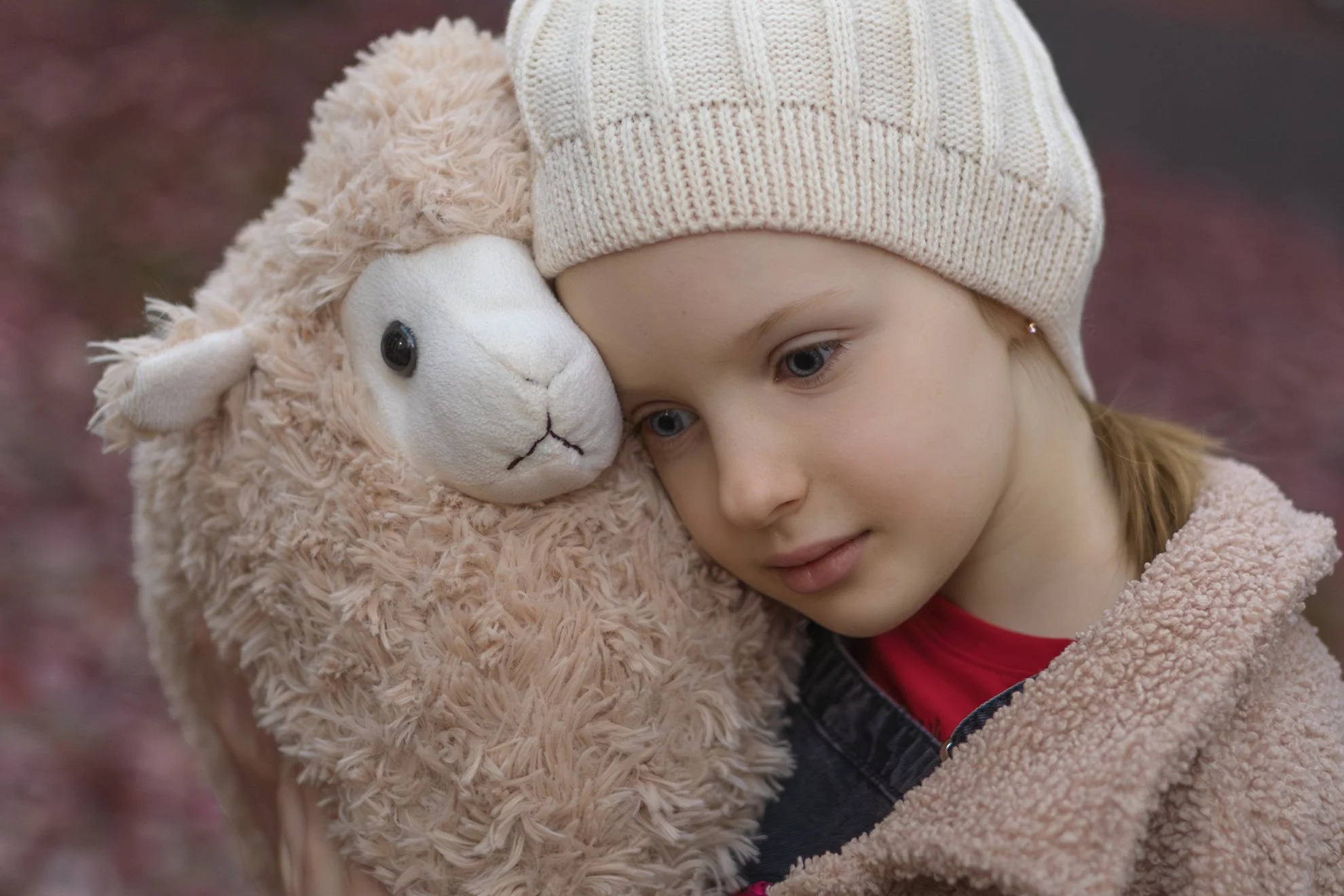 2025_11_05_IMG_0061 Girl with Sheep Toy.jpg