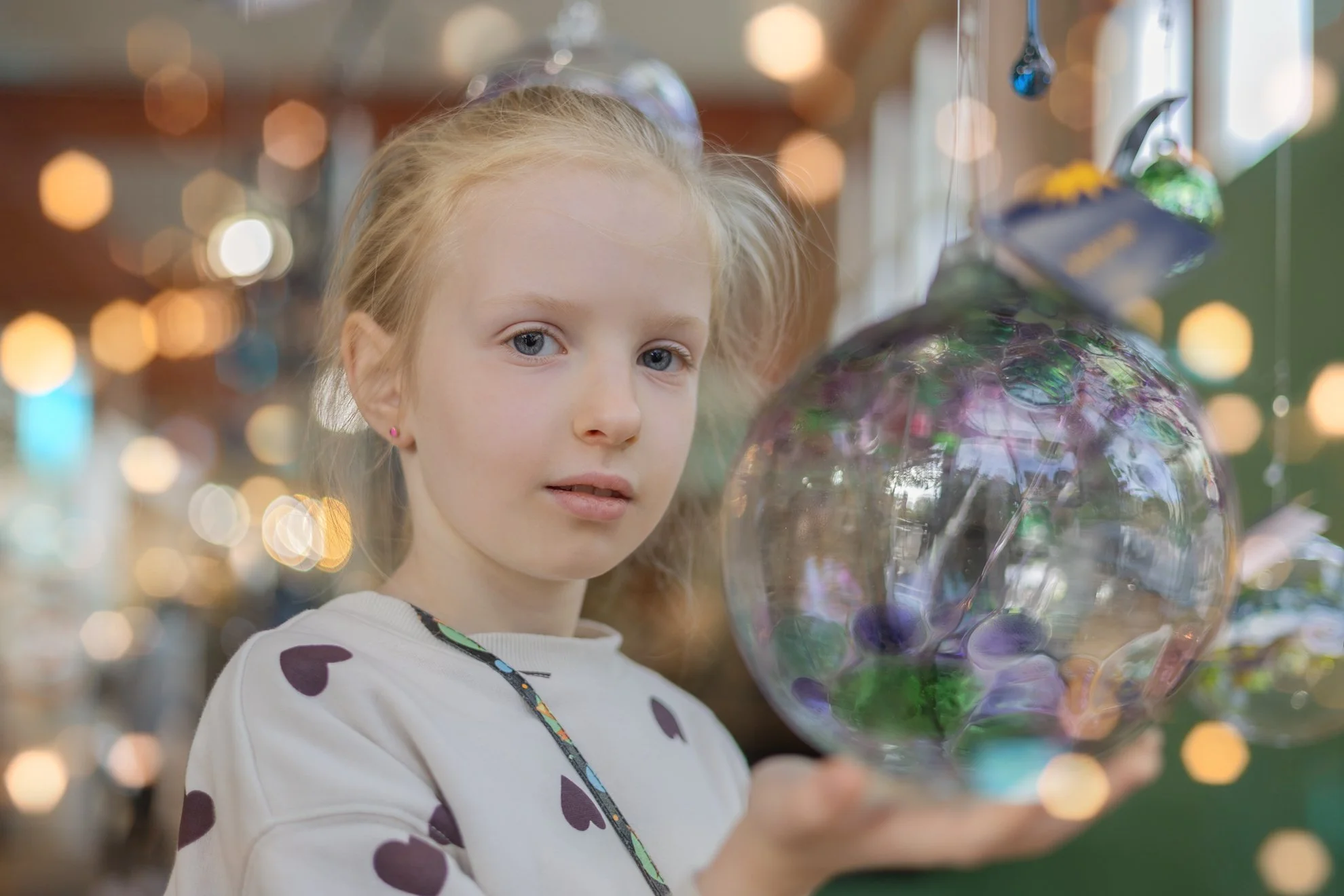 Girl and Glass Ball Toy