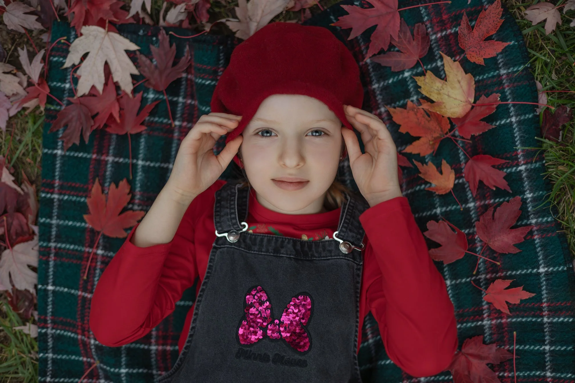 2025_11_05_IMG_0140 Girl on Blanket Red Leafs.jpg