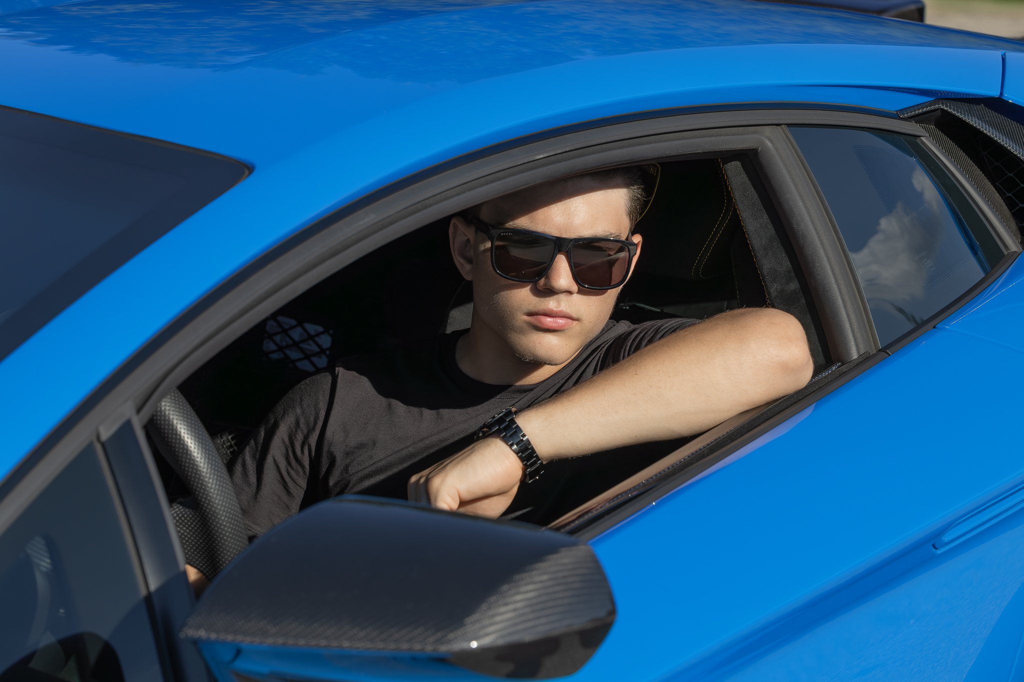 2024_09_22_0216 Young Man inside Blue Car.jpg
