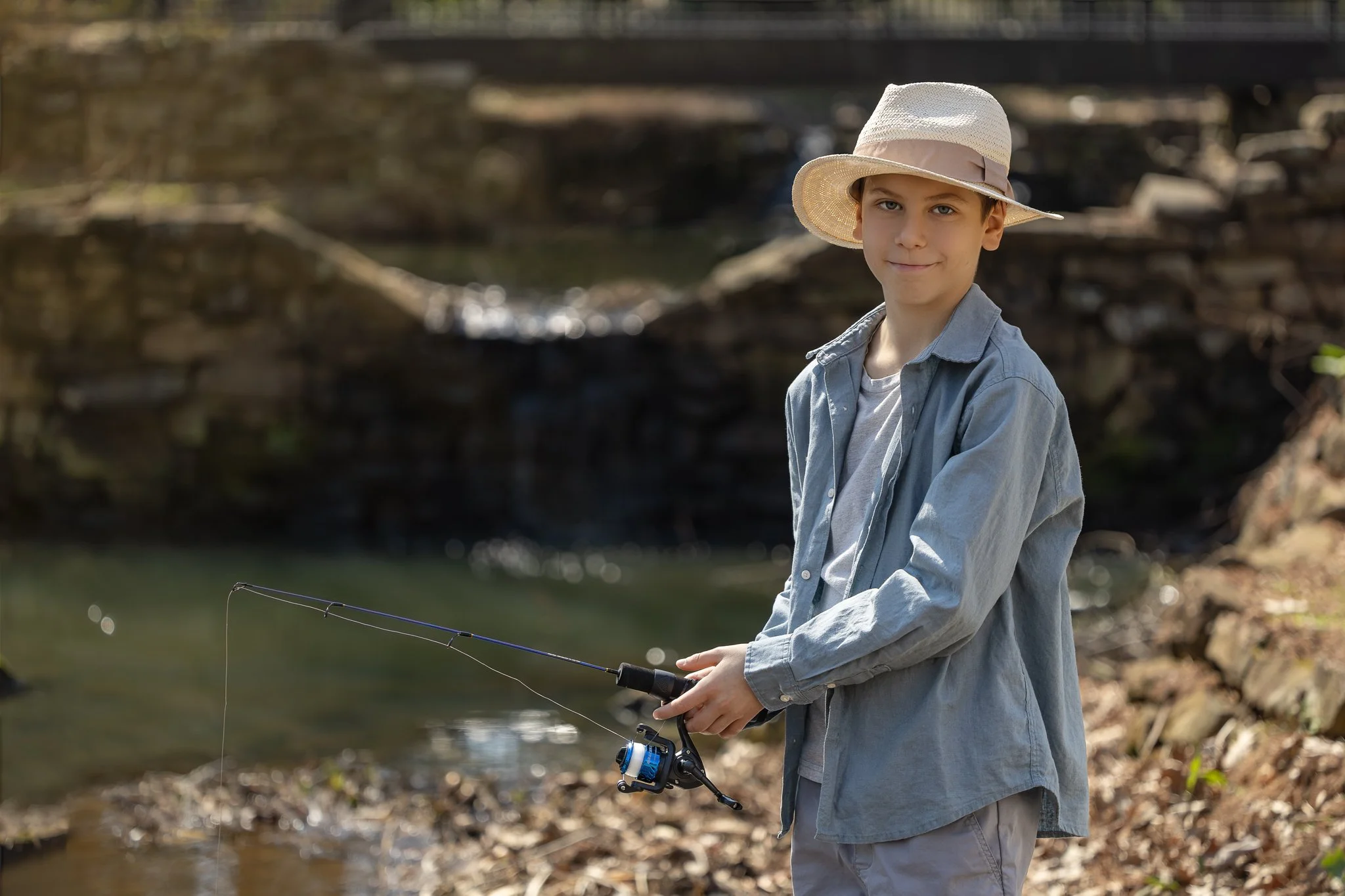 2026_03_01_IMG_0820 Boy in Hat Fishing.jpg