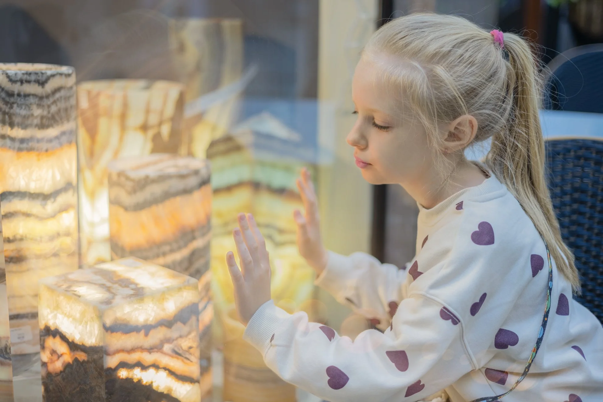 Girl and Display with Stones