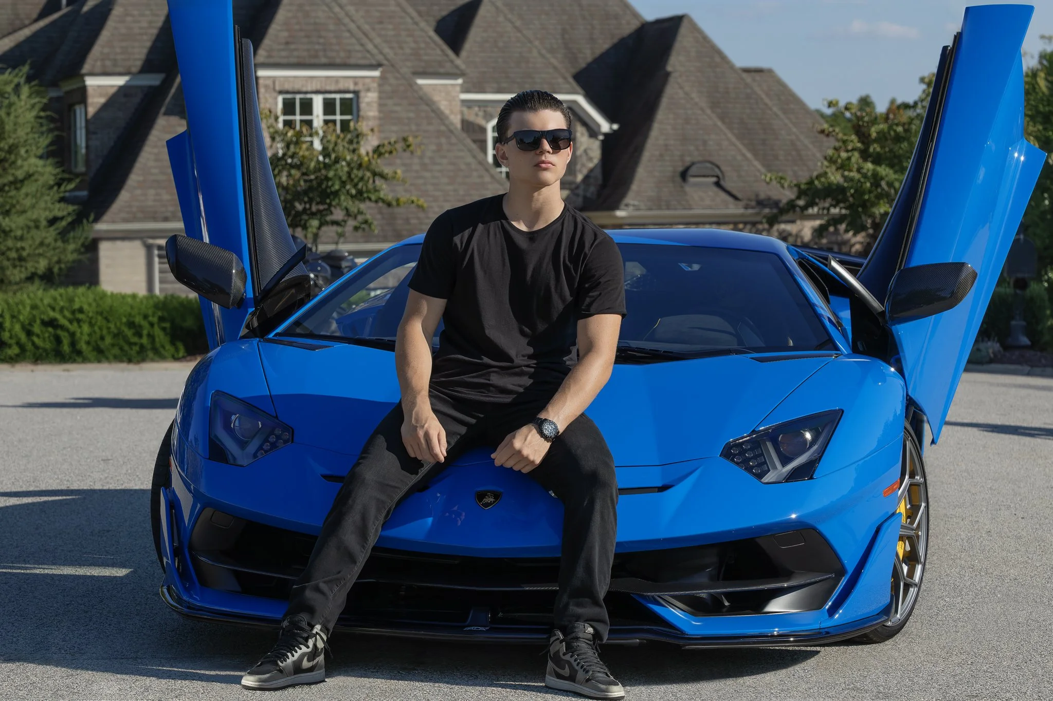 2024_09_22_0177 Young Man Blue Car Lamborghini Next Chapter.jpg