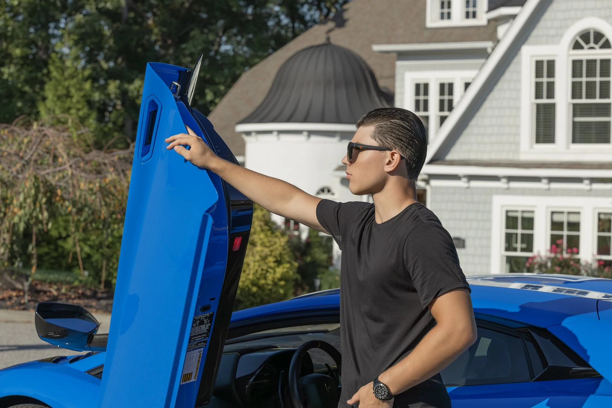 2024_09_22_0238 Young Man Blue Car Looking Ahead.jpg