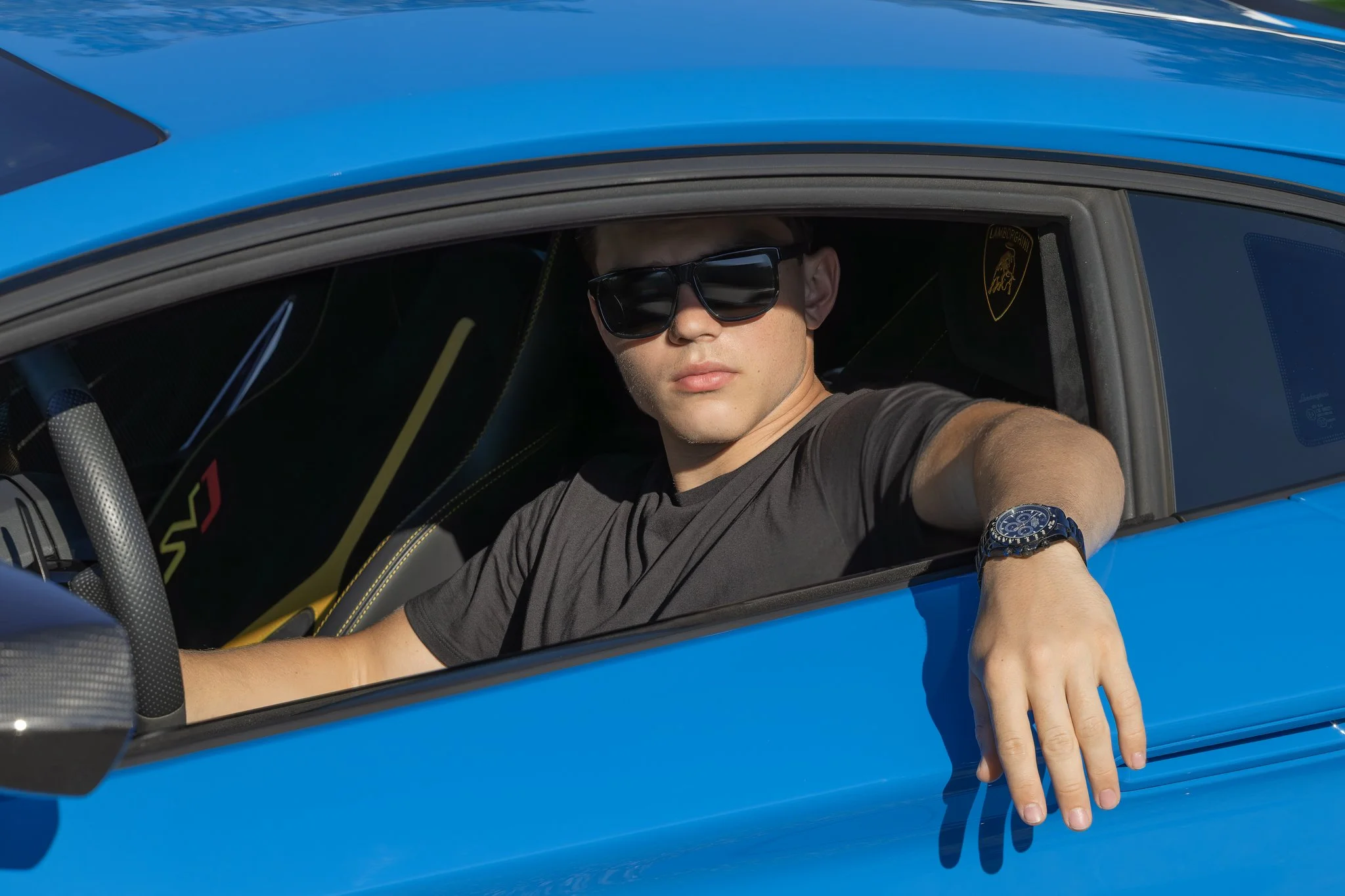 2024_09_22_0211 Young Man Blue Car in Control.jpg