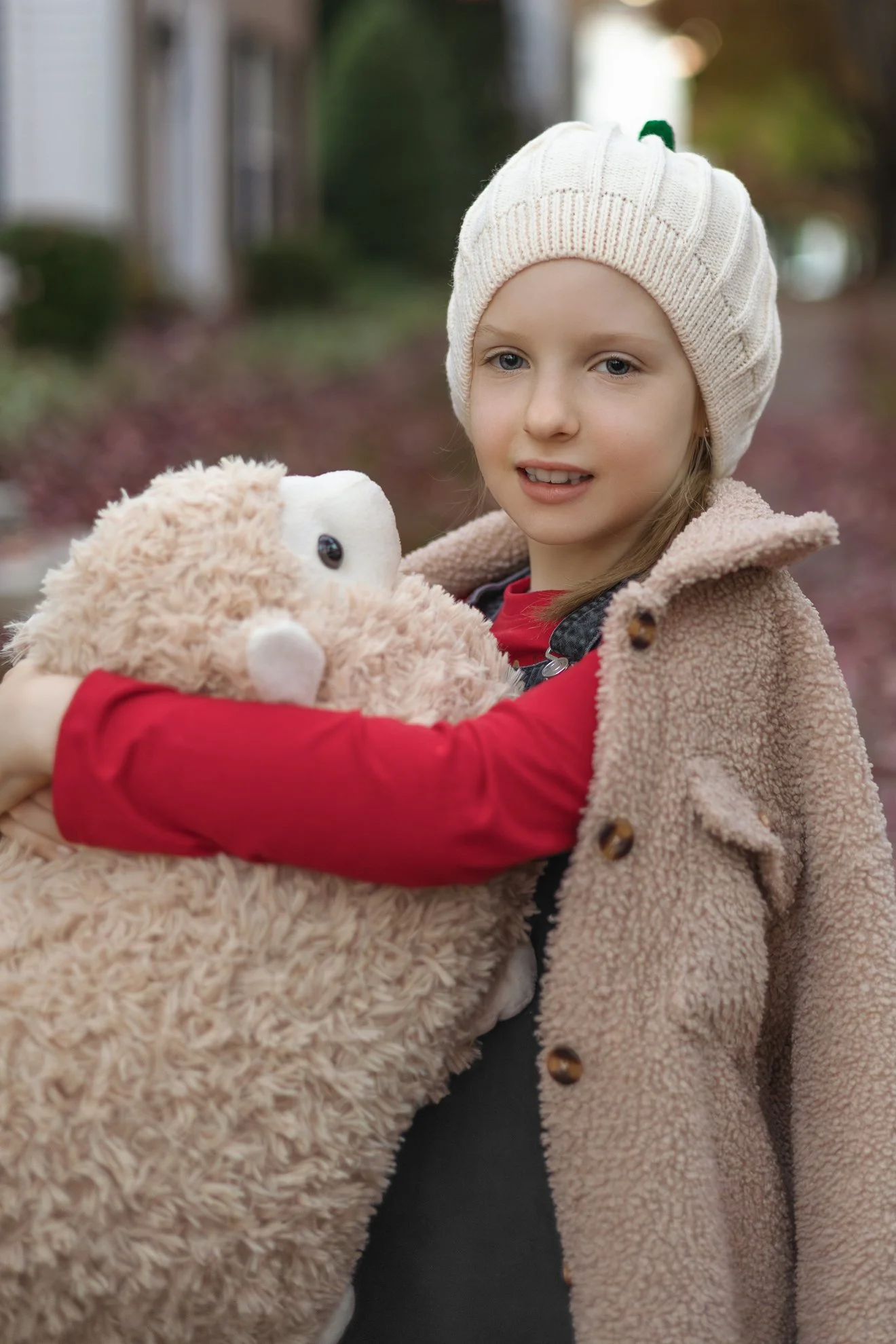 2025_11_05_IMG_0107 Girl with Sheep Toy.jpg