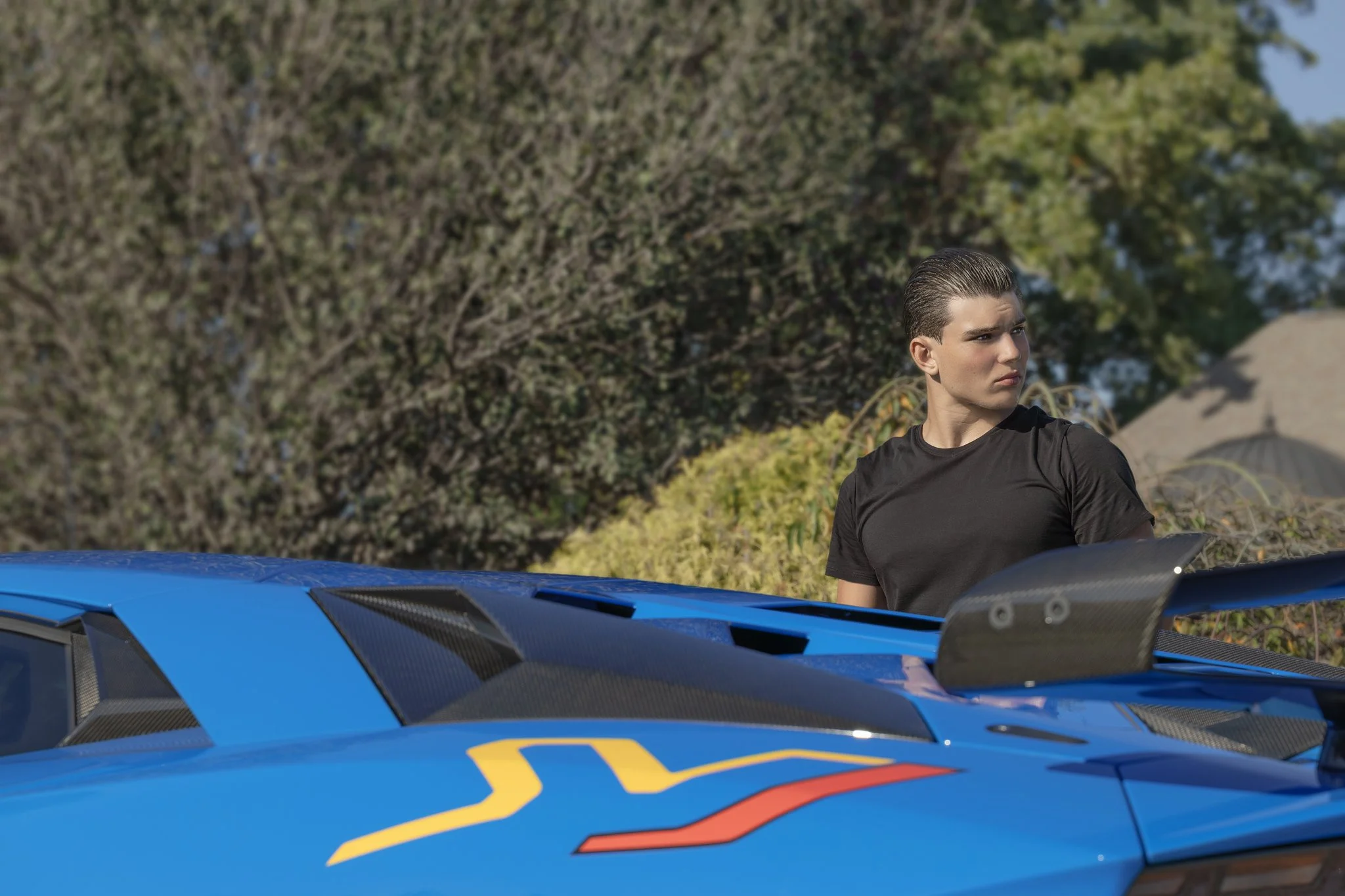 2024_09_22_0119 Young Man Blue Car Road Ahead.jpg
