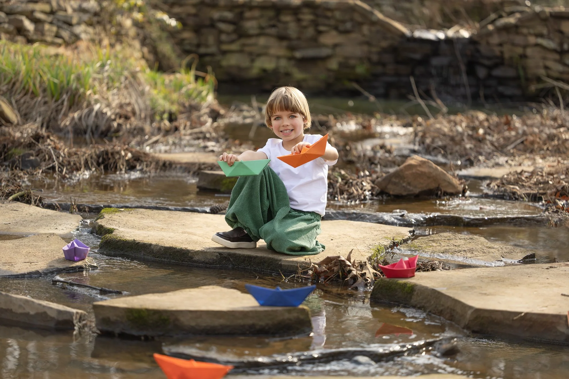 Child and Paper Boats 2026_03_01_IMG_2283 Boy Showing Papet Boats.jpg