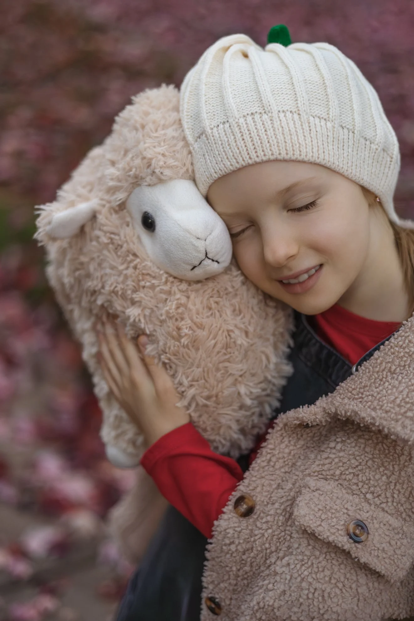 2025_11_05_IMG_0086 Girl with Sheep Toy.jpg