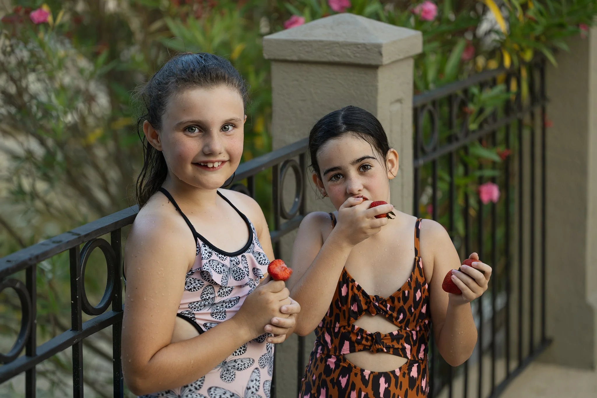 2025_06_22_IMG_0102 Girls and Strawberry Break between Pool Activities.jpg