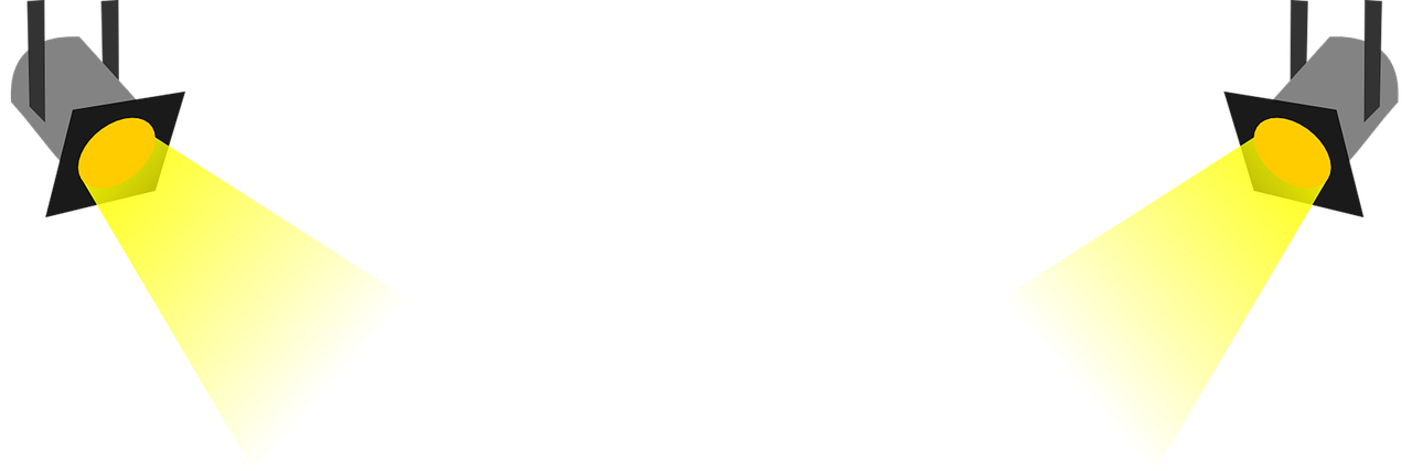 Stage lighting with two spotlights illuminating a yellow background.