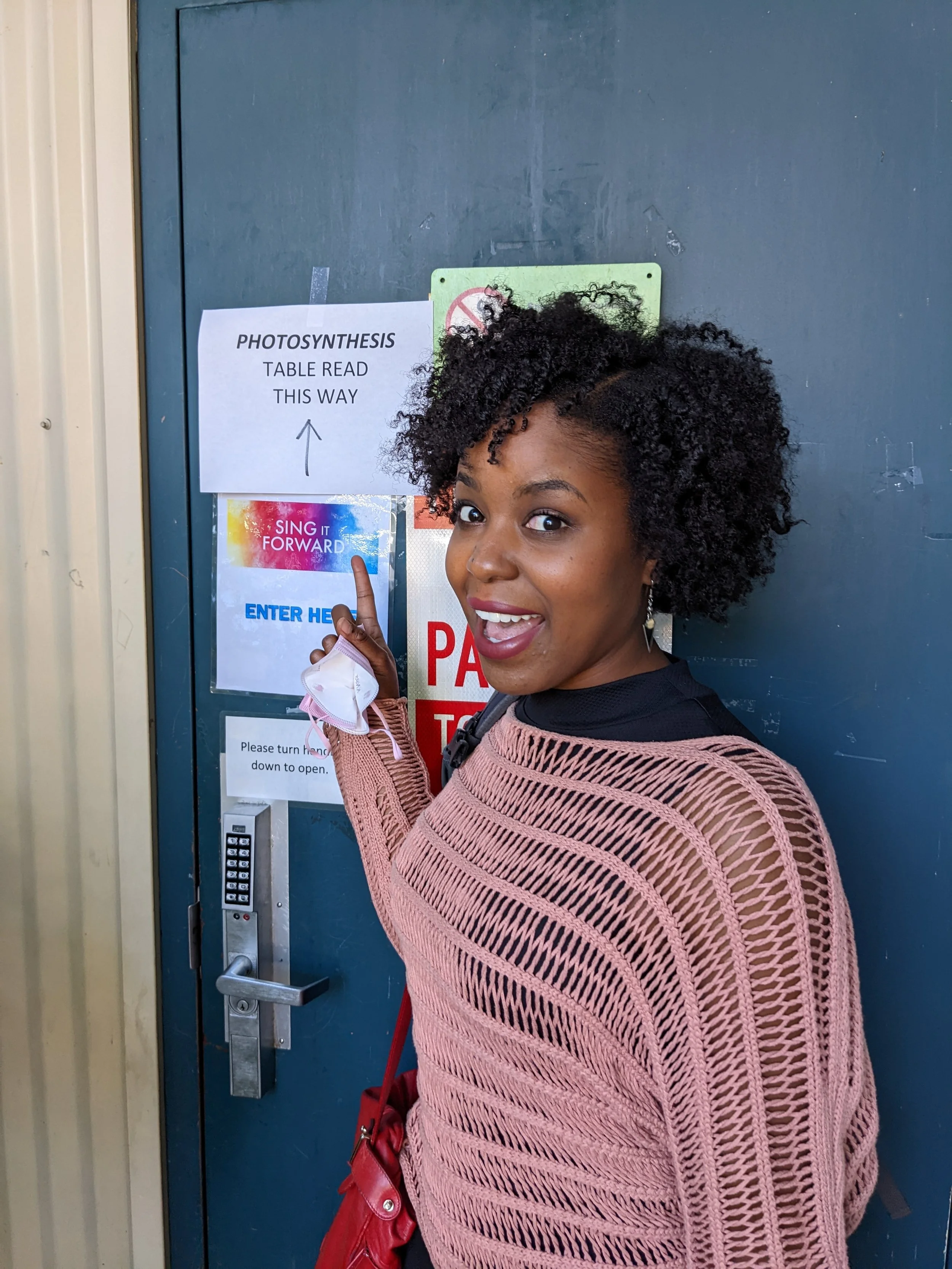 Claudine Mboligikpelani Nako smiles outside Village Theatre in advance of the first table read of Photosynthesis.