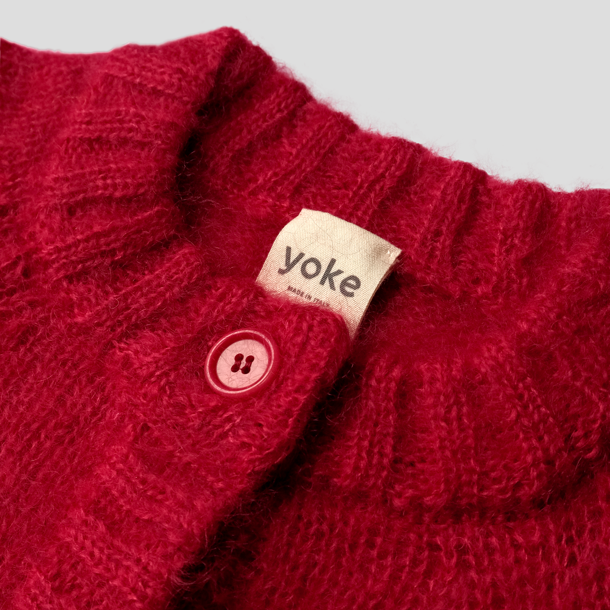 YOKE.STUDIOS.CLOTHING.AW25.REDcardiCU2.png