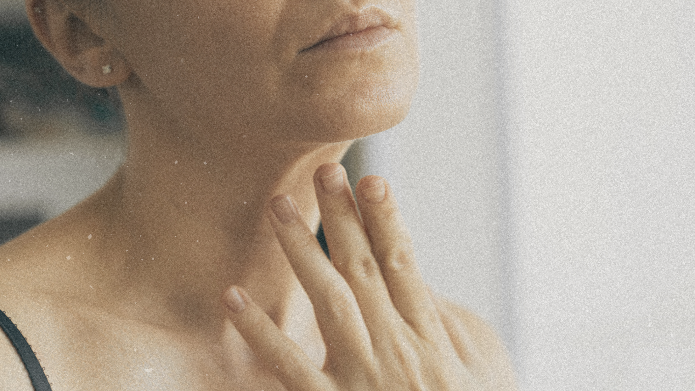 woman touching her neck wrinkled skin