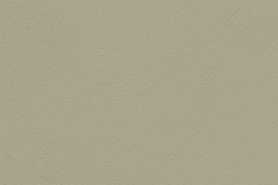 Plain beige wall with a textured surface.