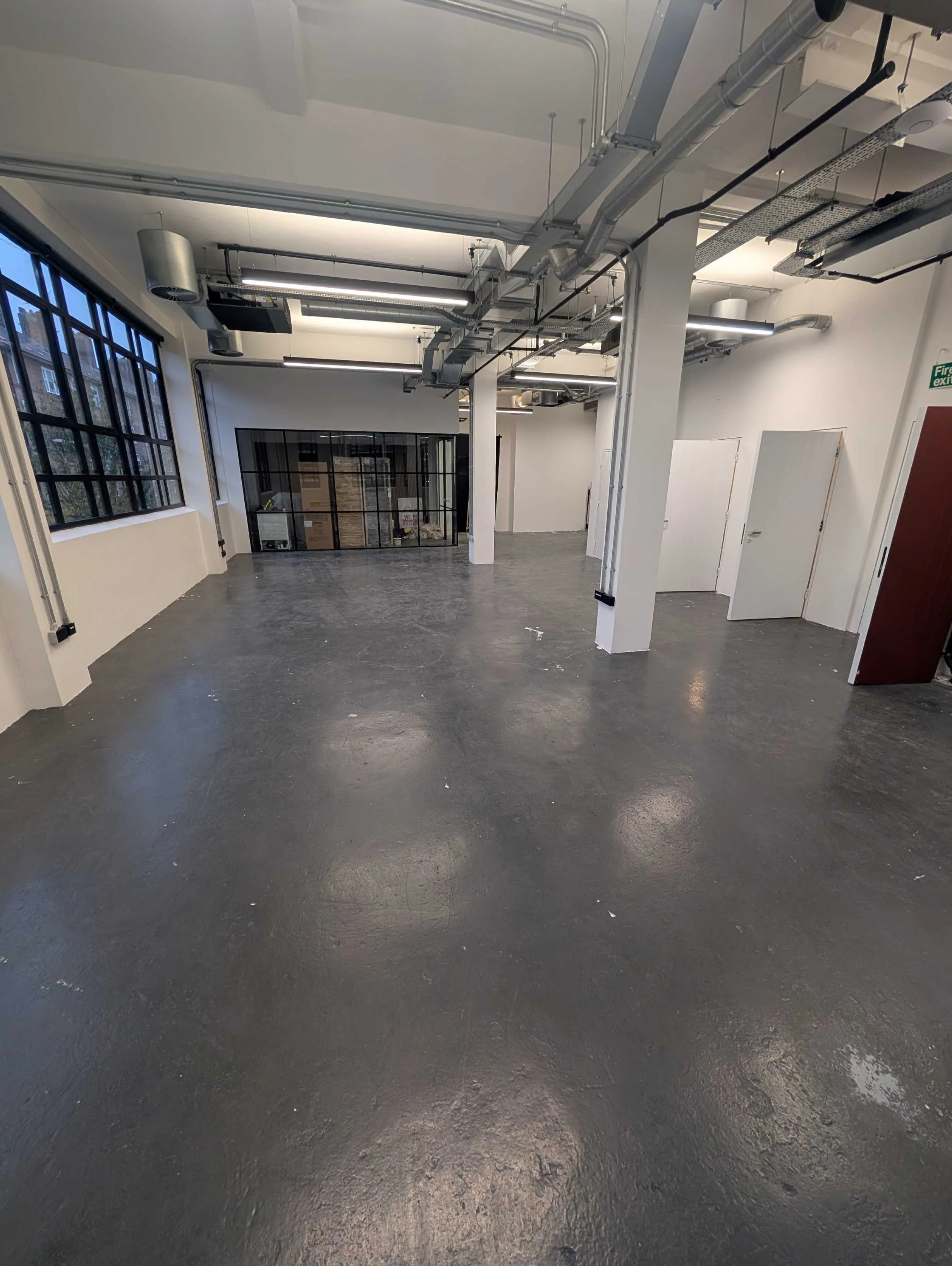 Before microcement refurbishment office floor