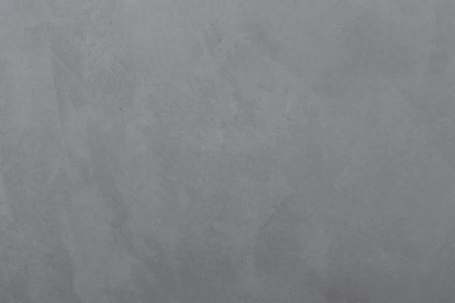 Solid gray background with a smooth texture.