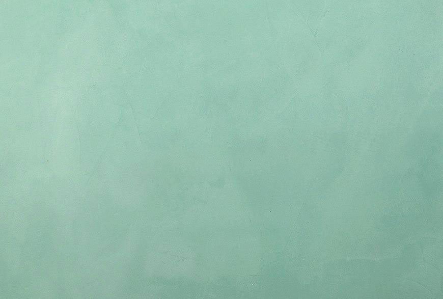 Solid light green wall or surface