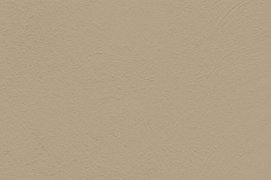 Plain beige textured wall