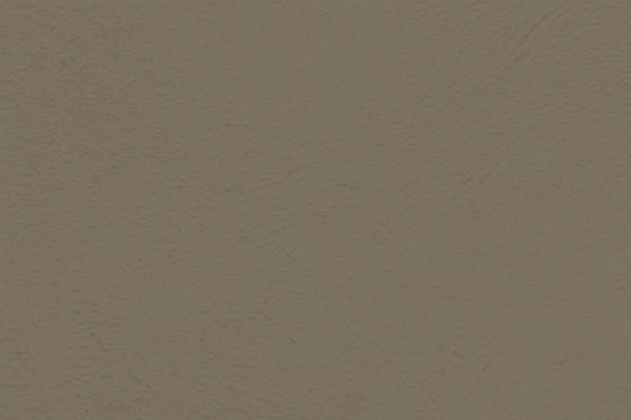 A plain beige wall with a subtle texture.