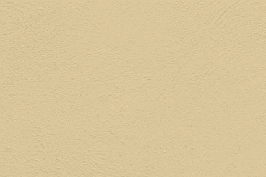A textured beige wall.