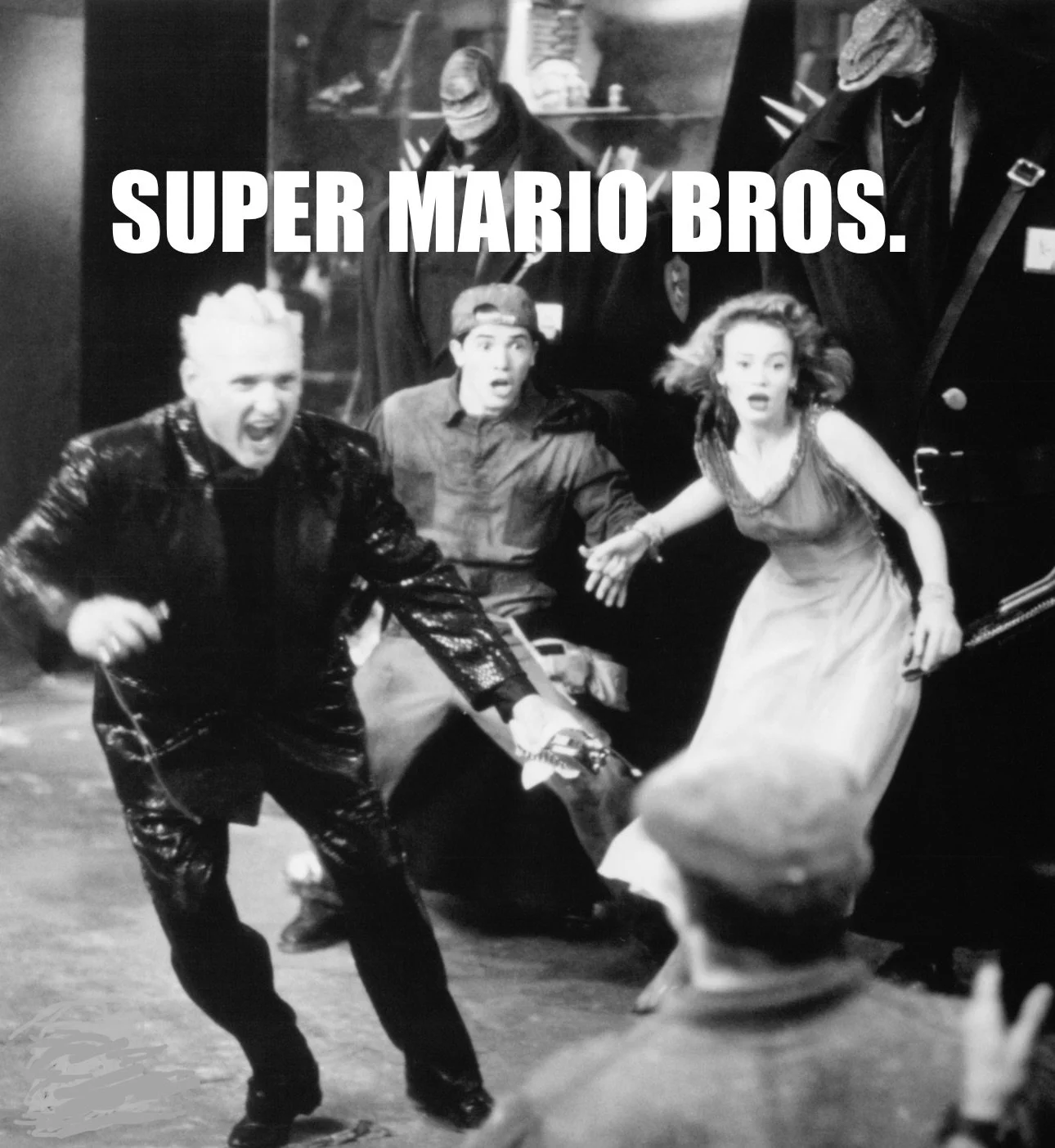 Black and white still from the movie 'Super Mario Bros.' featuring animated characters with surprised and frightened expressions, with two characters in the foreground and two in the background.