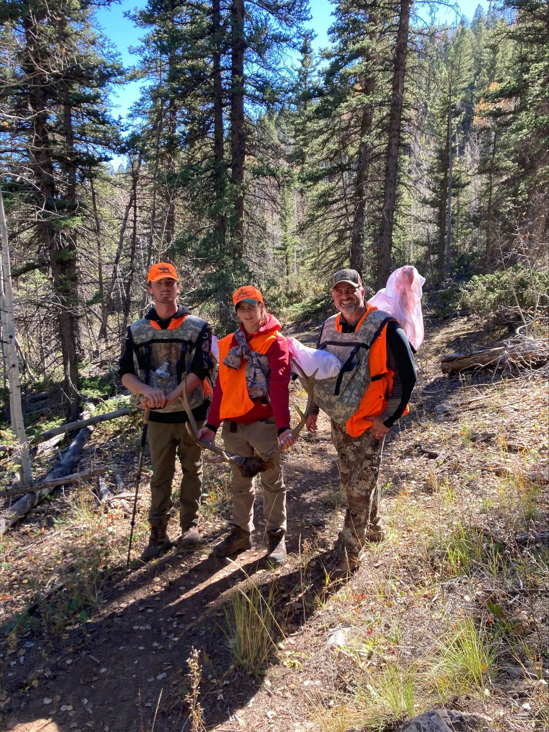 Nick D. using Pack Out Bags to pack out elk with his sons