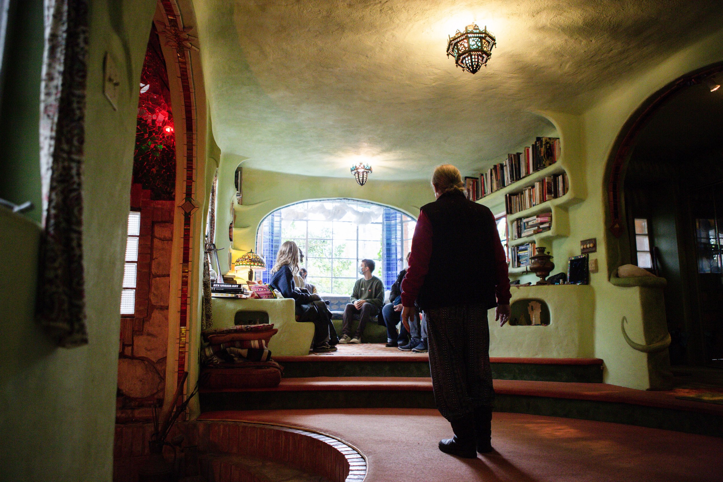 Talbot gives a tour to six people on Nov. 20, 2022. His tours go over the history of his house, creative architecture and inspirations behind its design.