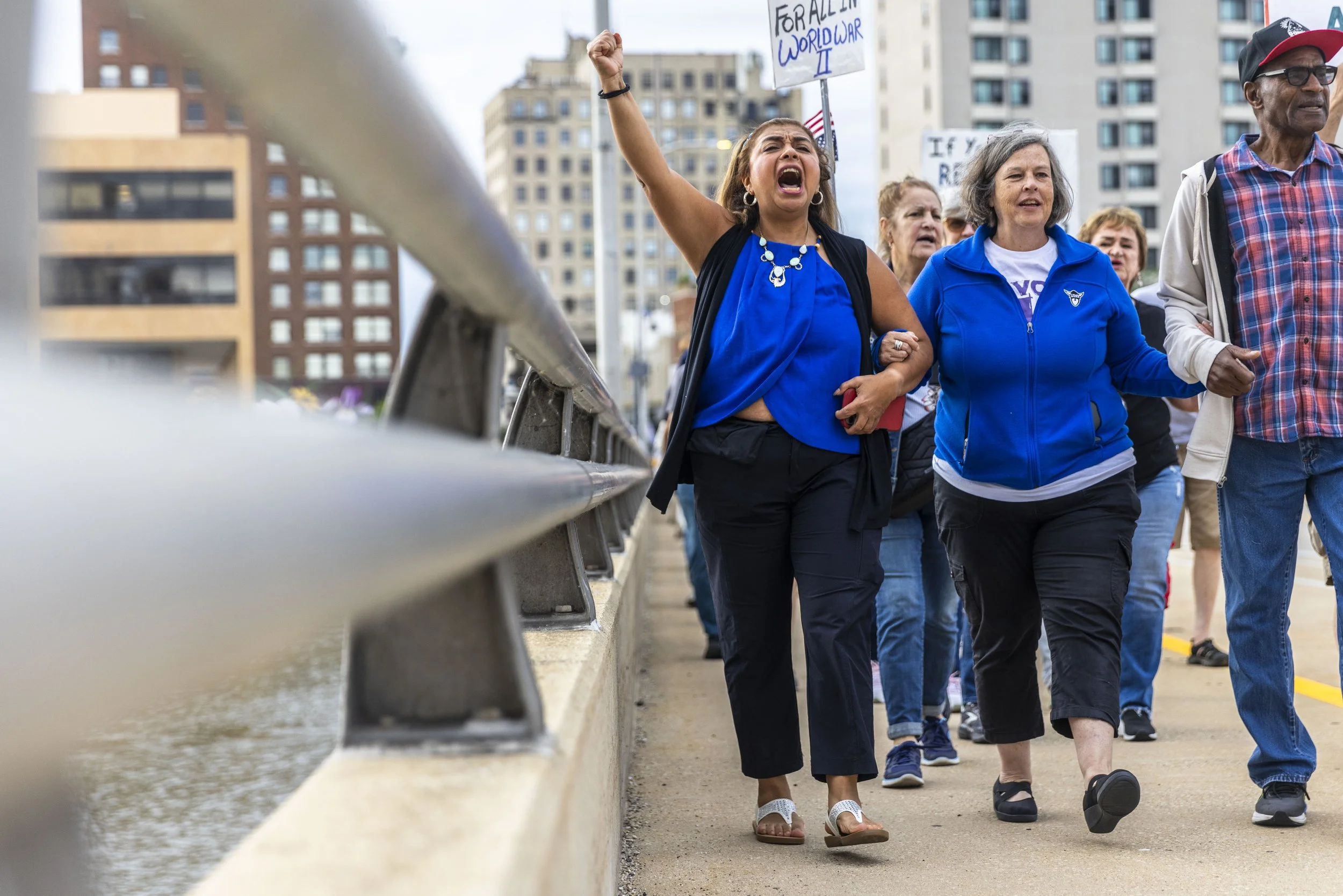 Cristina Gloria, left, chants during the "Good Trouble Lives On" protest on July 17, 2025, in downtown Rockford. 