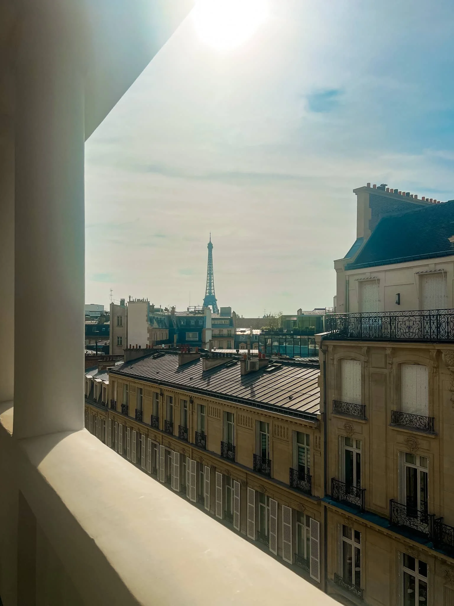 Eiffel Tower view from hotel room balcony