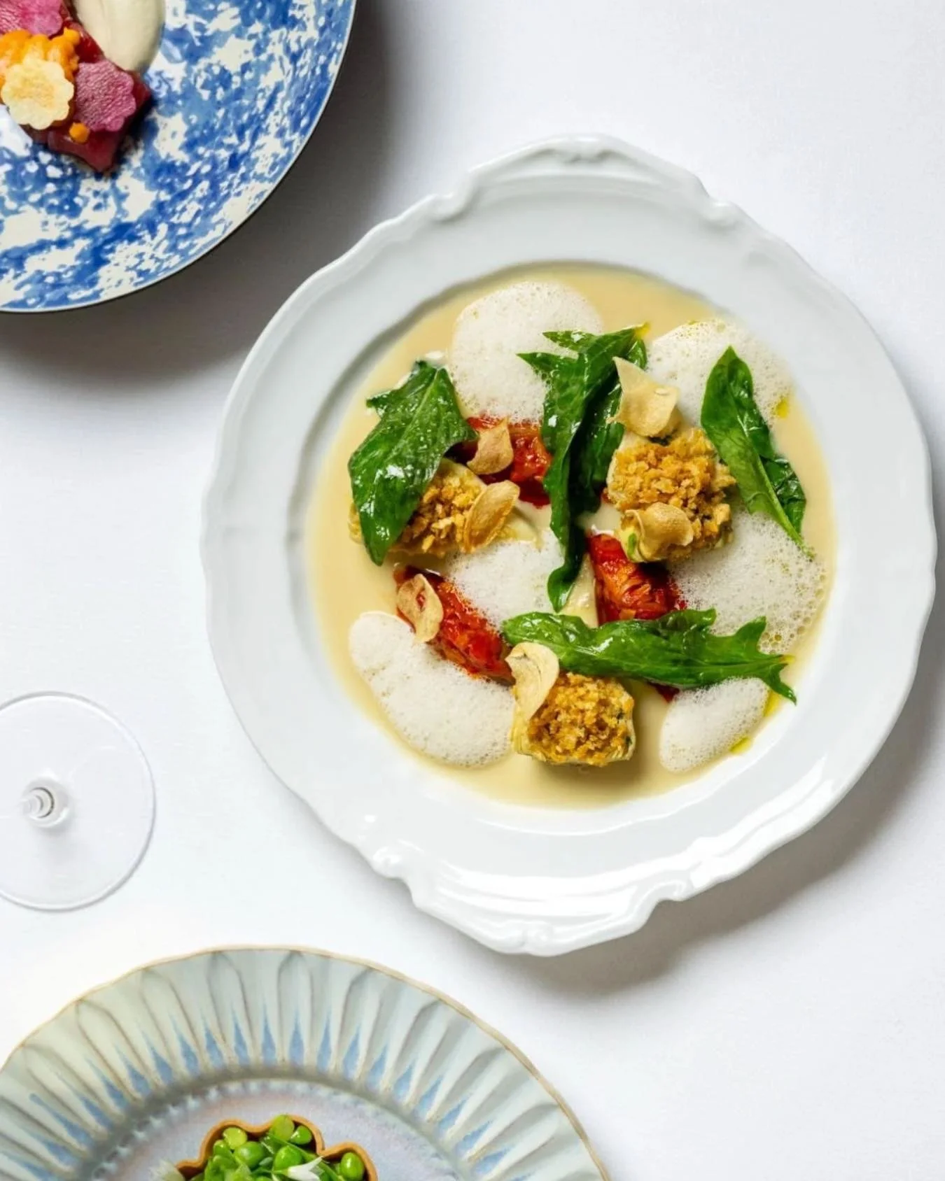 This dish from Caf&eacute; Carmellini brings the flavors of Provence to NoMad, with artichokes stewed in caper and anchovy butter, finished in a lightly frothed fennel sauce and garnished with crispy breadcrumbs.

#fora