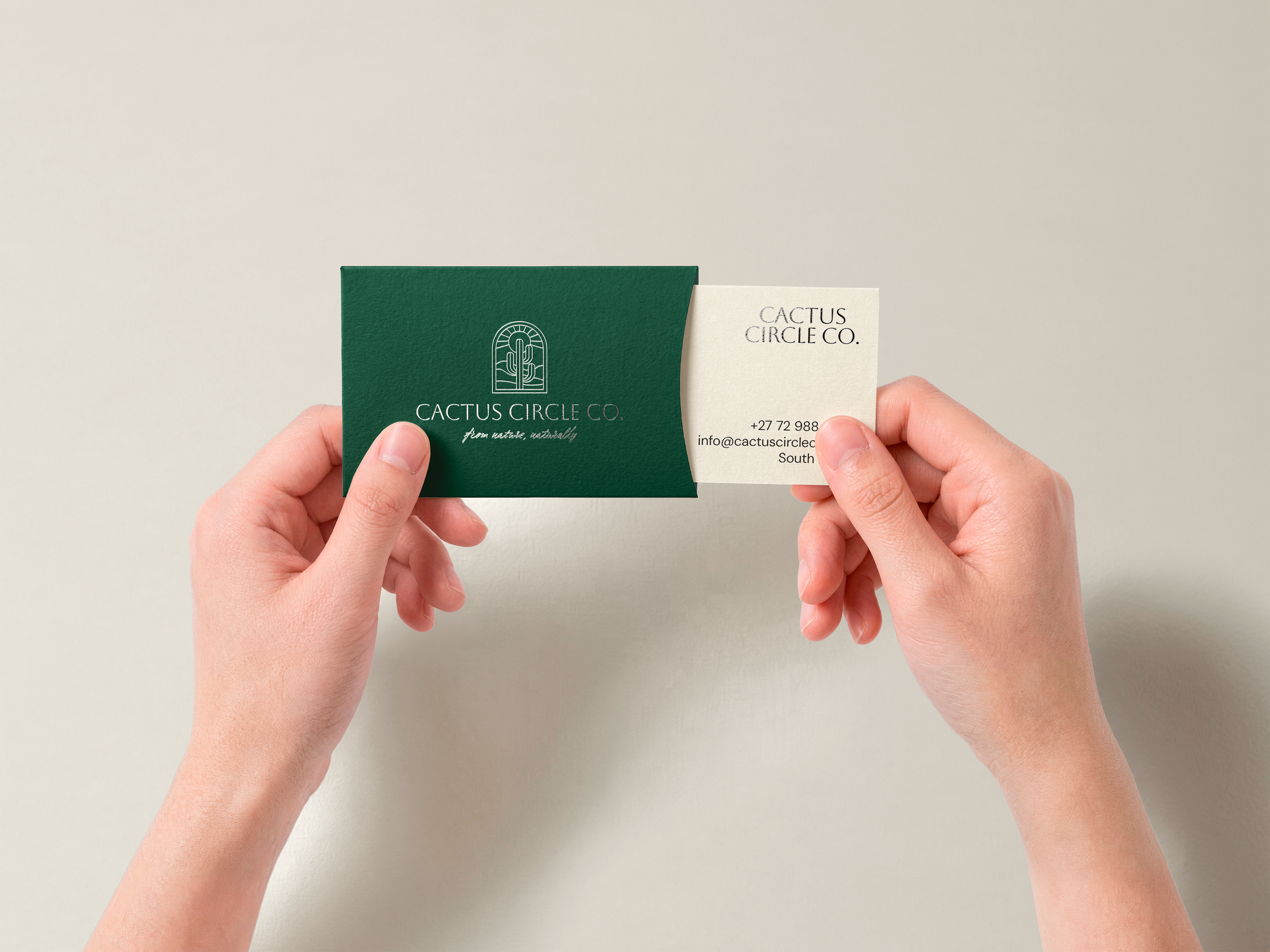 Top-Down-Business-Card-and-Sliding-Sleeve-Mockup-with-Hands.png